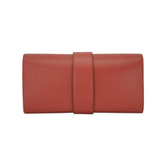 Medor 23 Clutch Bag Brique Tadelakt Leather with Gold Hardware