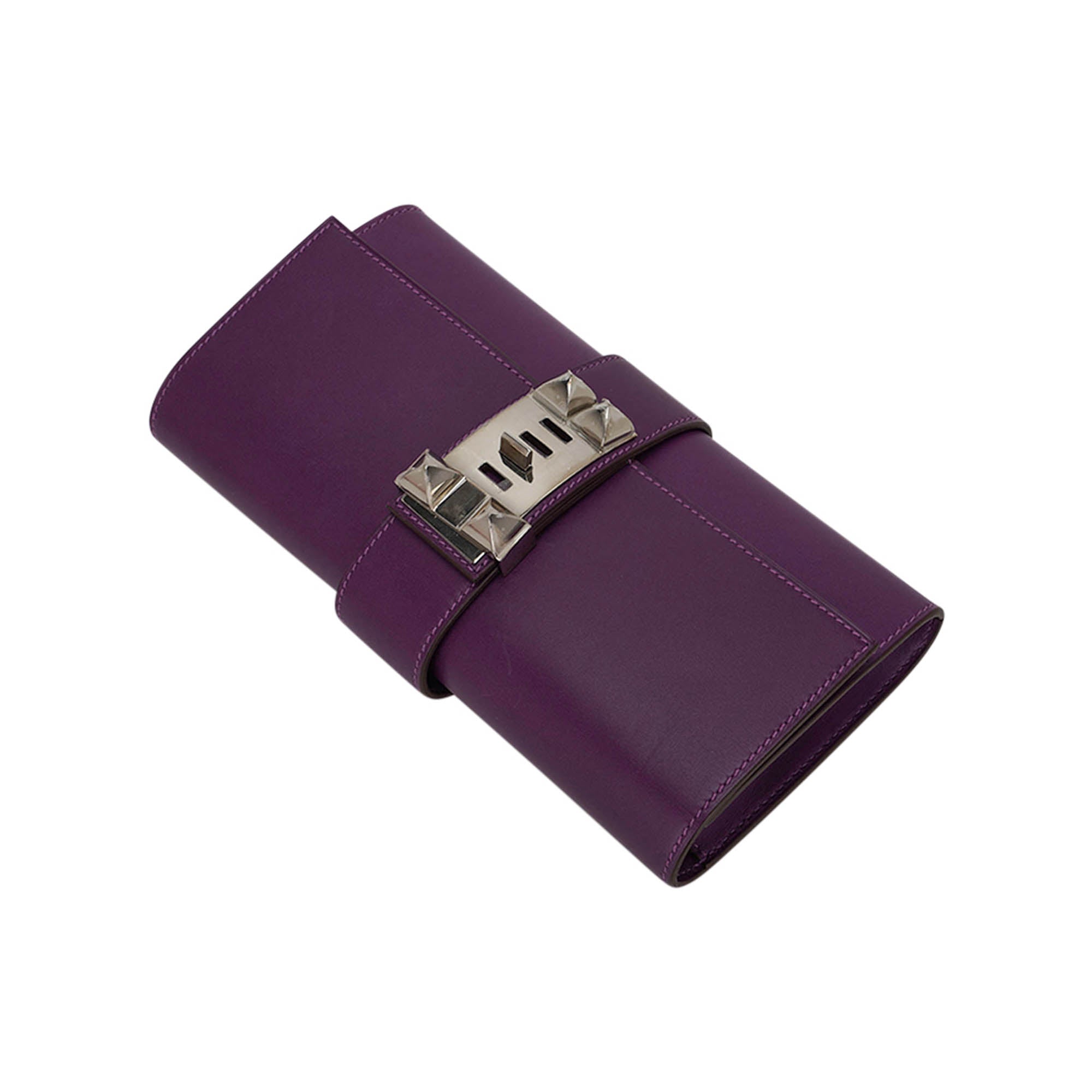 Medor 23 Clutch Bag Raisin Tadelakt Leather with Palladium Hardware